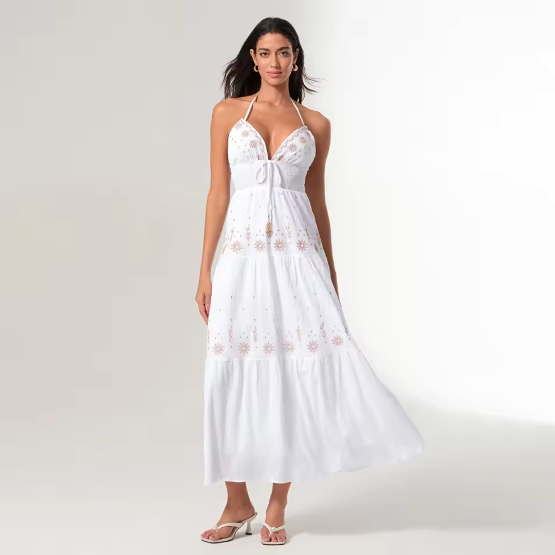 Vestido bohemio largo con detalles florales bordados