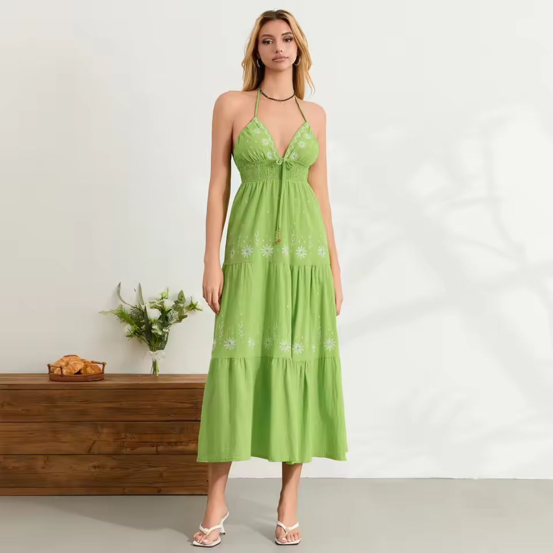 Vestido bohemio largo con detalles florales bordados